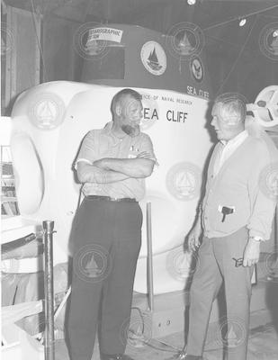 Cliff Winget talking with unidentified man