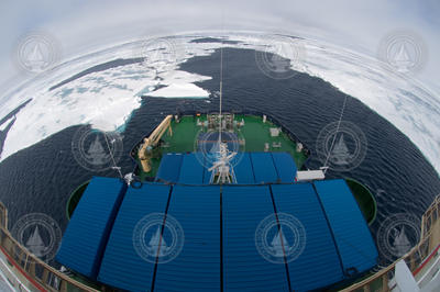 A fish-eye lens view of the bow of Oden underway.
