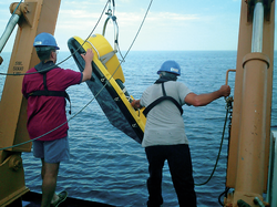 Deployment of low-frequency sonar system to detect fish and zooplankton.