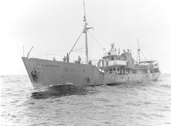 The Albatross III, full view with men on deck