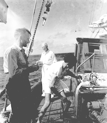 Frank Mather (center) with plankton net on deck
