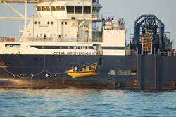 Researchers boarding Ocean Intervention III vessel.