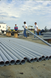 Jim Broda and others with coring tubes.