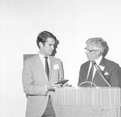 H. Burr Steinbach presenting an award to Robert Knox