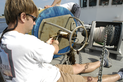 Postdoctral investigator Malcolm Scully with a recovered mooring