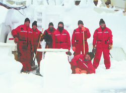 R/V Knorr captain and crew on an ice-covered deck in the Labrador Sea.
