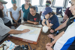 Ian Hanley teaching the students traditional navigation skills.