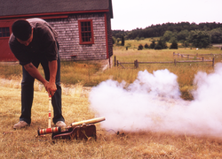 Dick Colburn firing 10-gauge cannon.