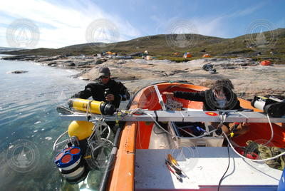 Jeff Pietro and Fiamma Straneo preparing a mooring in Greenland.