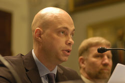 Robert Evans speaking at Congressional hearing.