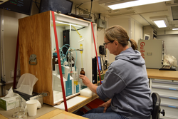 Leah Houghton working in the main lab on R/V Neil Armstrong.