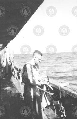 C. Godfrey "Gus" Day at the rail of Albatross III