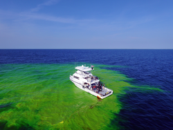Aerial view of R/V Discovery testing REMUS oil spill tracking.