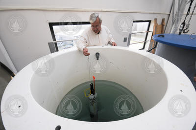 Bob Tavares testing a float in the float test tank.