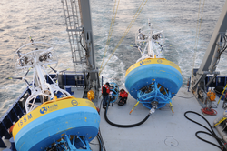 OOI surface moorings stowed on the deck of R/V Neil Armstrong.