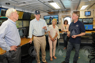 Larry Madin talking to U.S. Rep. William Keating and his wife, Tevis.