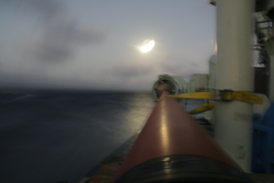 Murky view of the long core barrel on R/V Knorr.