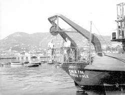 Standing on stern of Chain