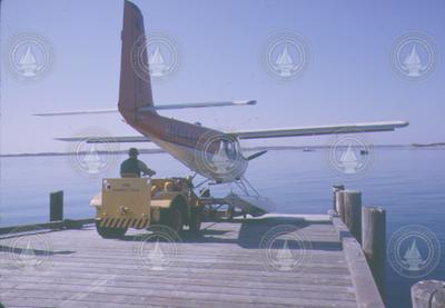 Helio Courier aircraft taking off from Dyer's Dock ramp.