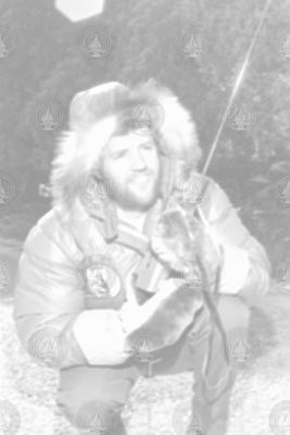 Charles Hollister in parka with radio