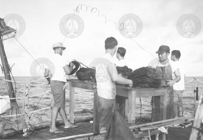 Anton Bruun - crew working with coiled cable