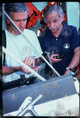 Holger Jannasch looking at the samples retrieved from Alvin.