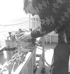 Sam Raymond working on deck of Atlantis II