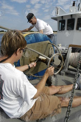 Postdoc Malcolm Scully working on a mooring with Rocky Geyer.