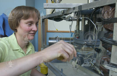 Linda Kalnejais working with the SQUIRT benthic flux chamber instrument.