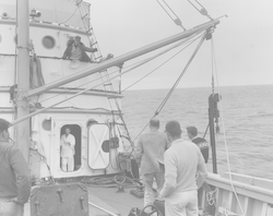 Group on deck of Bear with hydraulic corer.
