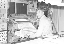 Dick Chase working in top lab aboard Chain