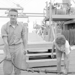 Betty Bunce and Dave Fahlquist on WHOI dock.