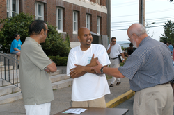 Rick Rupan (center) and John Farrington (right) at street festival.