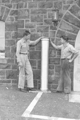 Maurice Ewing [left] and Allyn Vine with container for recorder