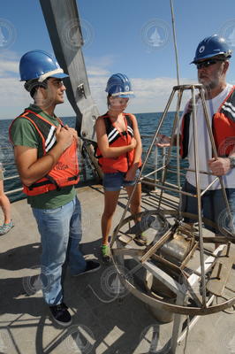 Manyu Belani and Samantha Whitmore listening to Hovey Clifford's instructions.