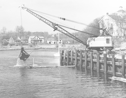 Crane being used during construction of Redfield Laboratory.