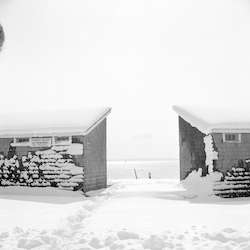 Nobska Beach bath houses covered with snow.