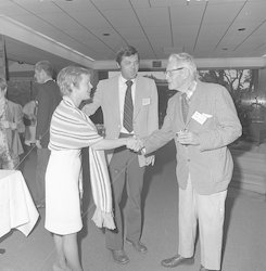 Joan Grice and George Grice greeting Alfred Redfield (R).