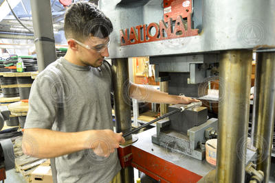 Cody Meissner terminates wire rope in the Rigging Shop.