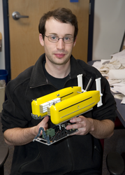 Casey Machado holding HROV Nereus model, 1:14 scale.