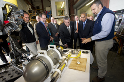 Rich Camilli showing the governor and other guests the Tethys mass spectrometer.