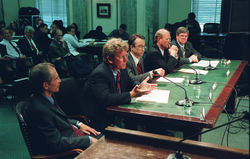 Bill Curry (second from left) speaking before a committee of the US Senate
