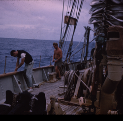 Unidentified men working on the deck
