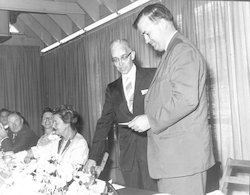 Paul Fye presenting Bruce Heezen with the Bigelow Medal.