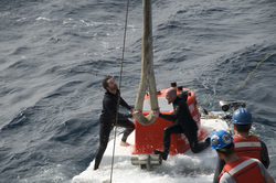 Ronnie Whims and Patrick Neumann attach Alvin lift line for recovery.