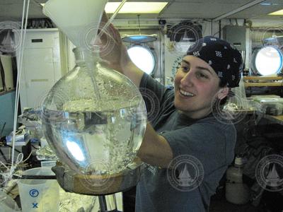 Mar Nieto Cid filtering seawater in R/V Oceanus wet lab.