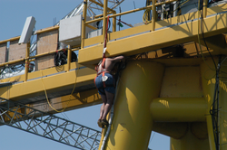 Rob Olson running cable underneath the ASIT.