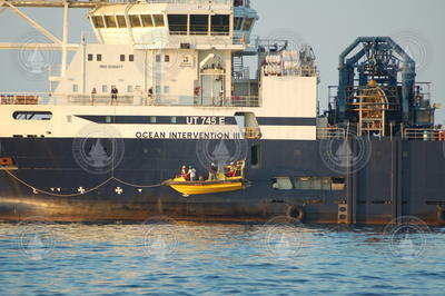 Researchers boarding Ocean Intervention III vessel.