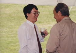 Graduate Wen Xu talking with Jake Peirson.