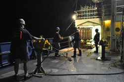 Removal of a CTD rosette from its hangar on R/V Atlantis.
